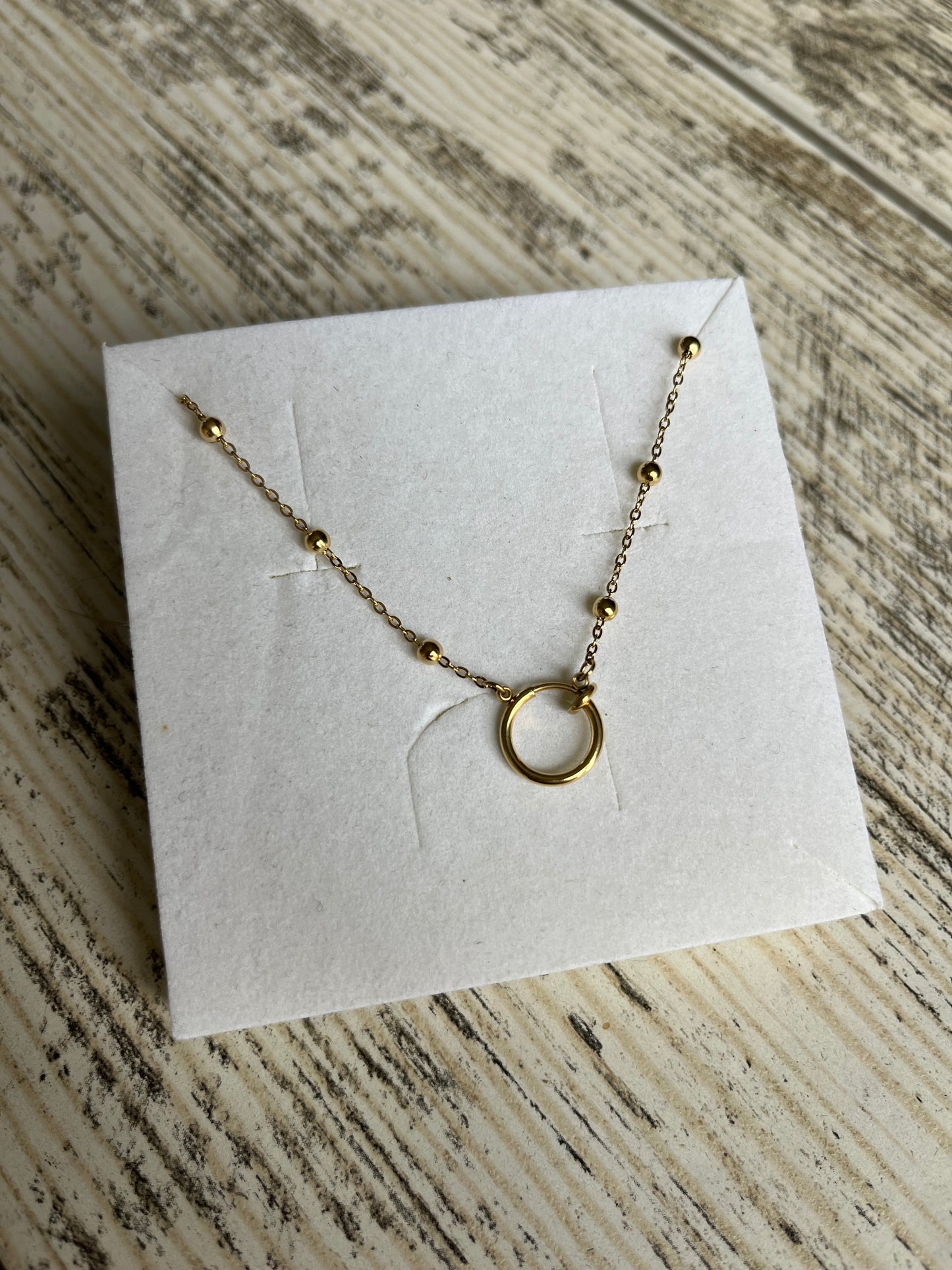 Collier couleur or perle en acier inoxydable