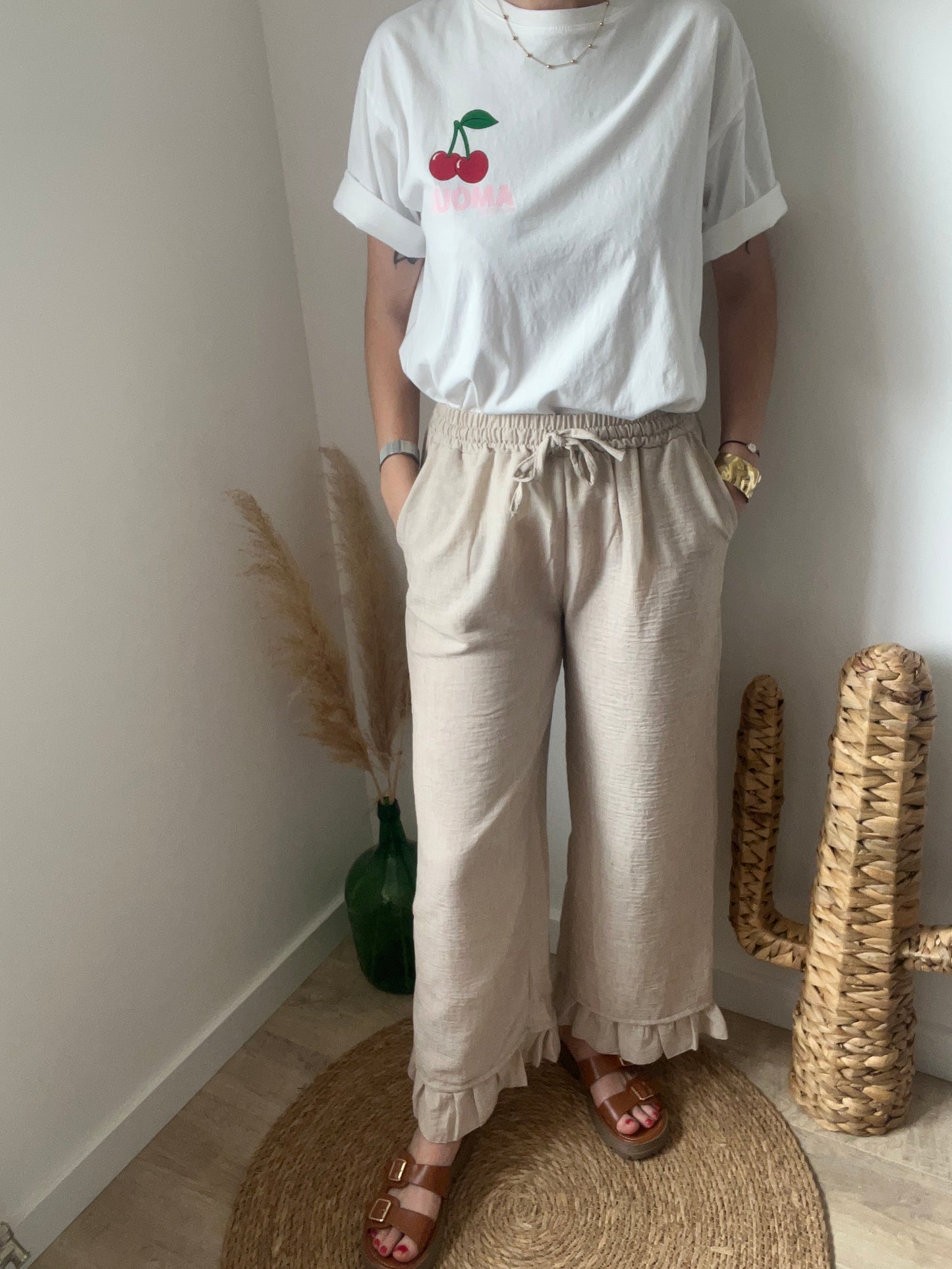 Élastique à la taille, avec deux poches sur le côté