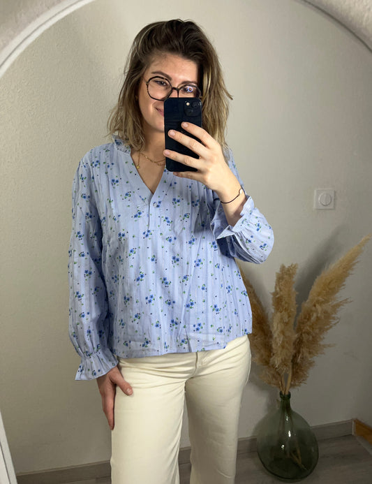 Blouse élégante fleurie de couleur bleu 