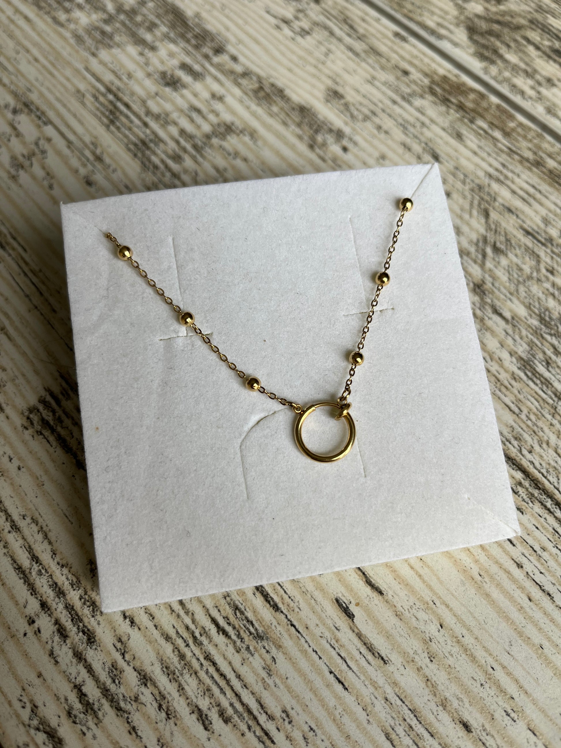 Collier couleur or perle en acier inoxydable 