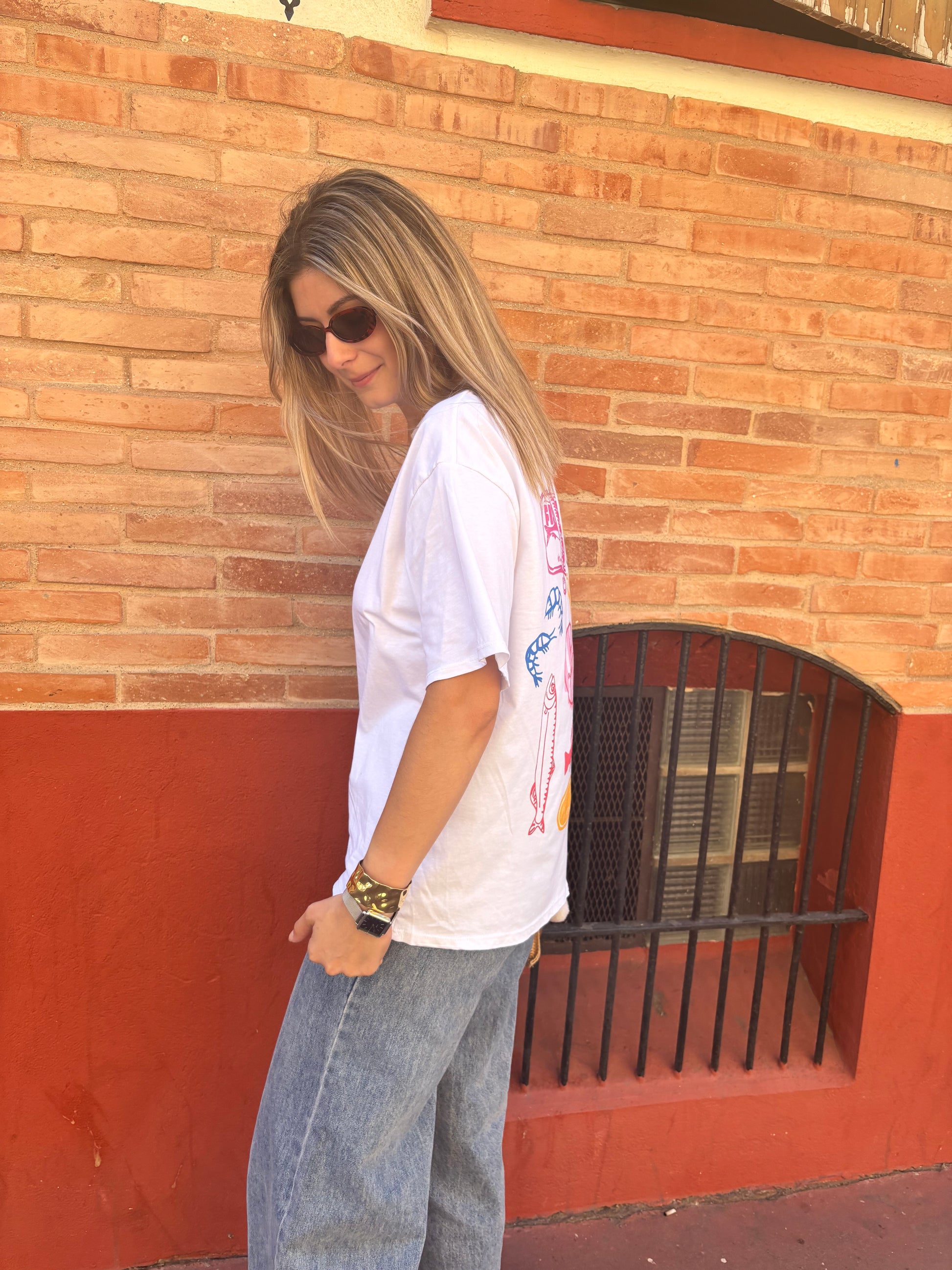 tshirt pour femme de couleur blanc a motifs dans le dos pour un look tendance et decontracté 